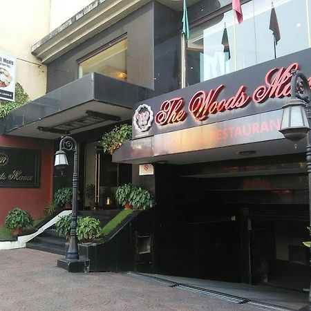 The Woods Manor Mg Road Hotel Kochi Exterior foto